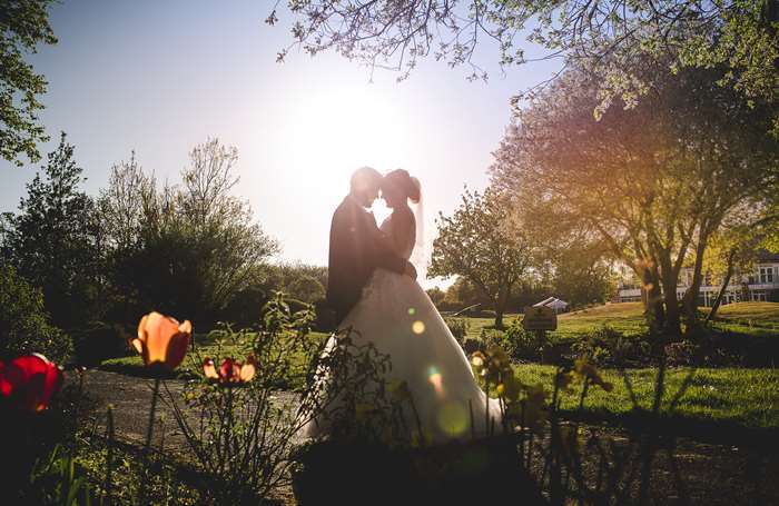 Bride and groom in the sunlight